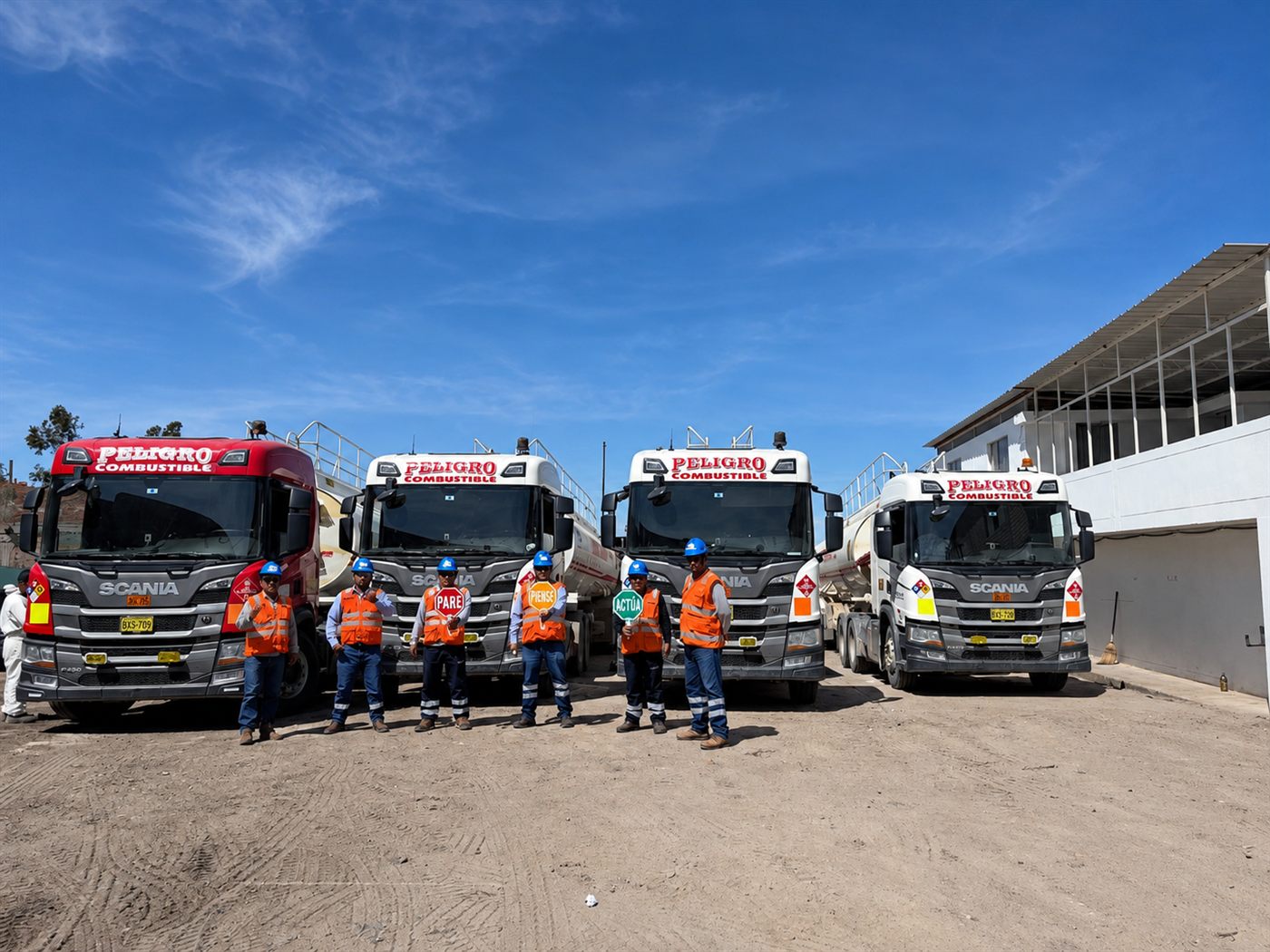 Equipo de FARES frente a la flota de cisternas